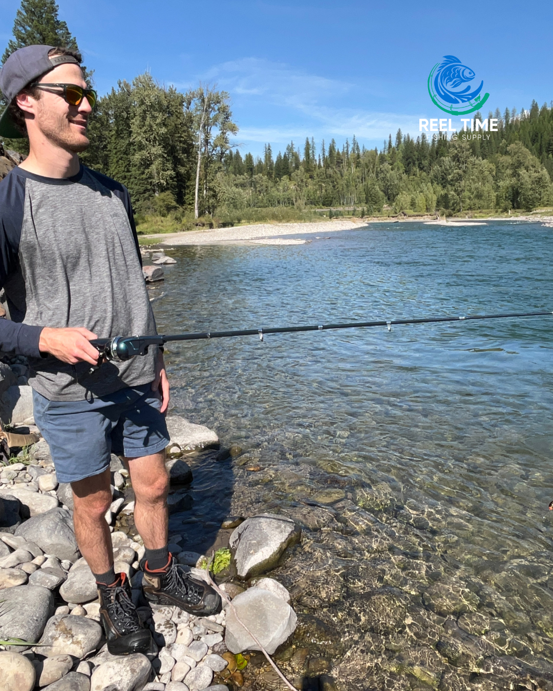 Angler holding a netted fish with the Foldable Travel Fishing Rod in view.