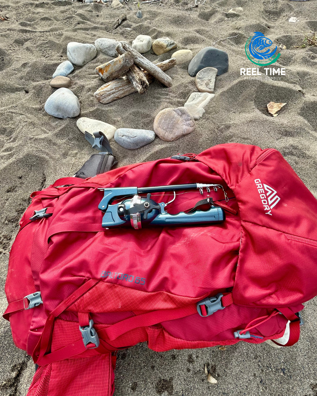 Foldable Travel Fishing Rod resting on a red backpack at a beach campsite.